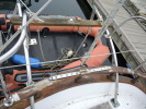 Boat has leak in starboard tube. Appears repairable. Davits and stern rail in decent shape.